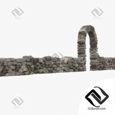 Каменная подпорная стена с аркой.