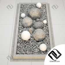 Flowerbed large white pebbles