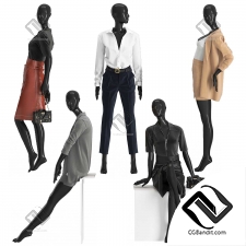 Female mannequins with clothes