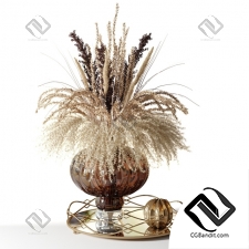 Букет A bouquet of dried flowers in a pot-bellied brown vase on a tray