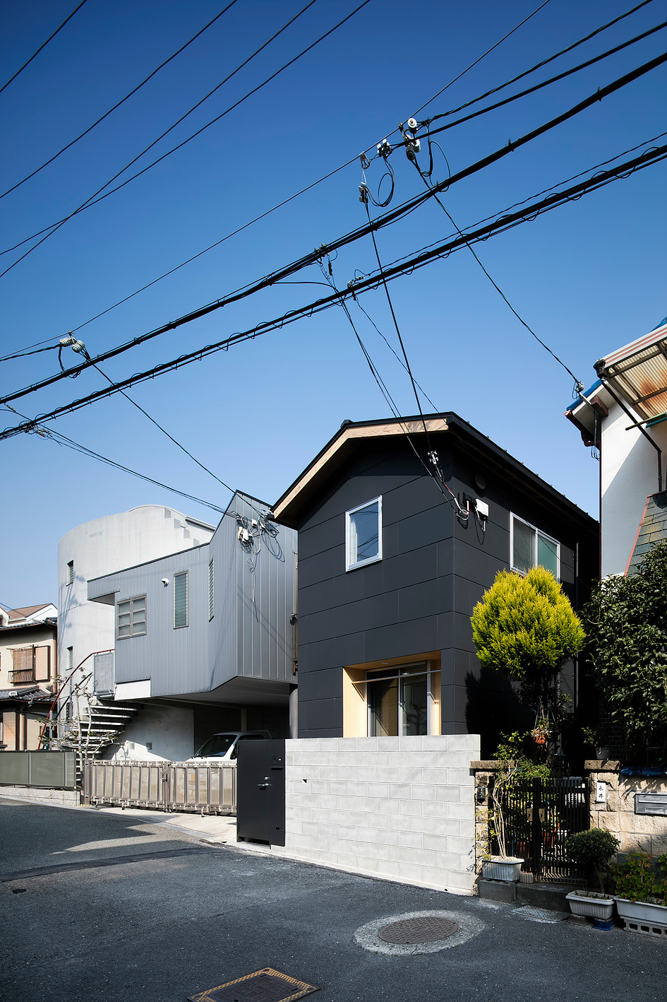 House in Ishibashi by NRM* Architects Office